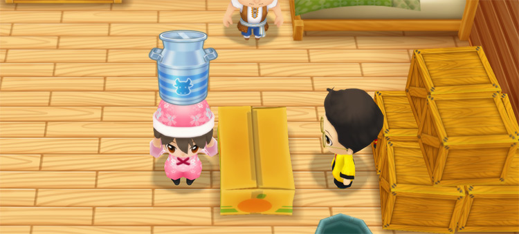 The farmer stands in front of Huang's counter while holding X Milk.