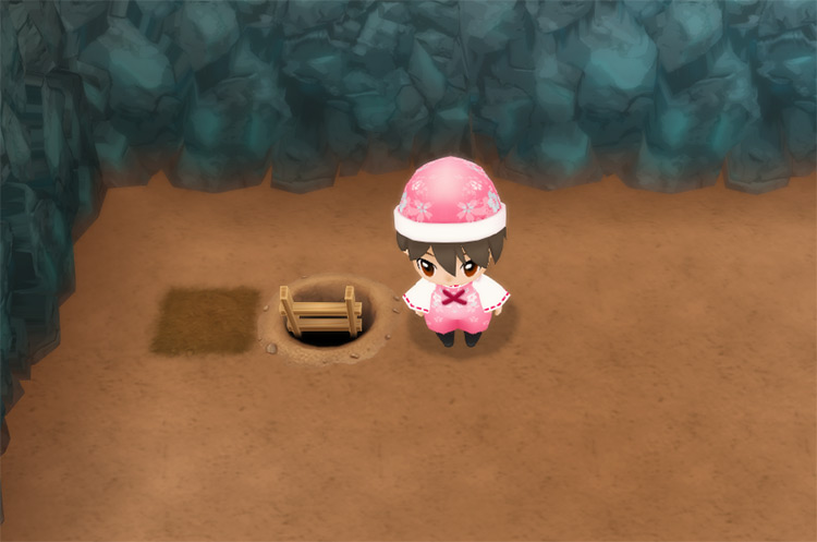 The farmer stands beside a ladder in the Lake Mine.