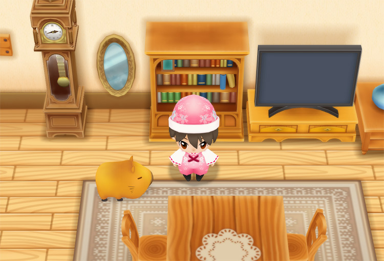 The farmer stands in front of the bookshelf.